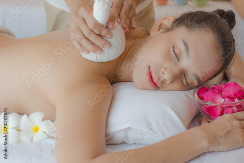 Young Asian woman relaxing in the Spa.