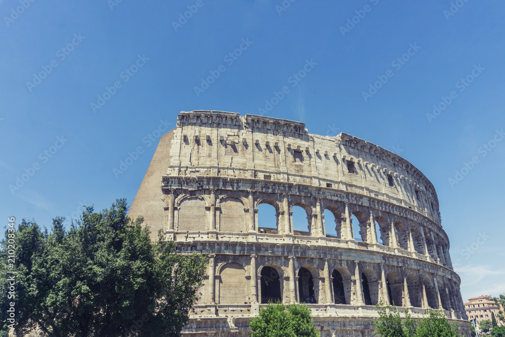 View of the Colosseum in Rome, Italy. The Colosseum is one of the most popular tourist attractions in Rome