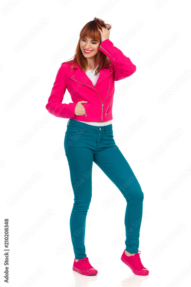 Happy Smiling Young Woman Is Holding Hand In Hair Happy Smiling Young Woman Is Holding Hand In Hair