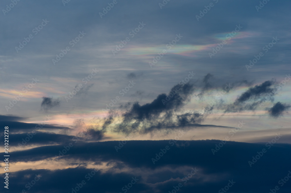 Fototapeta premium rainbow clouds in the sunset