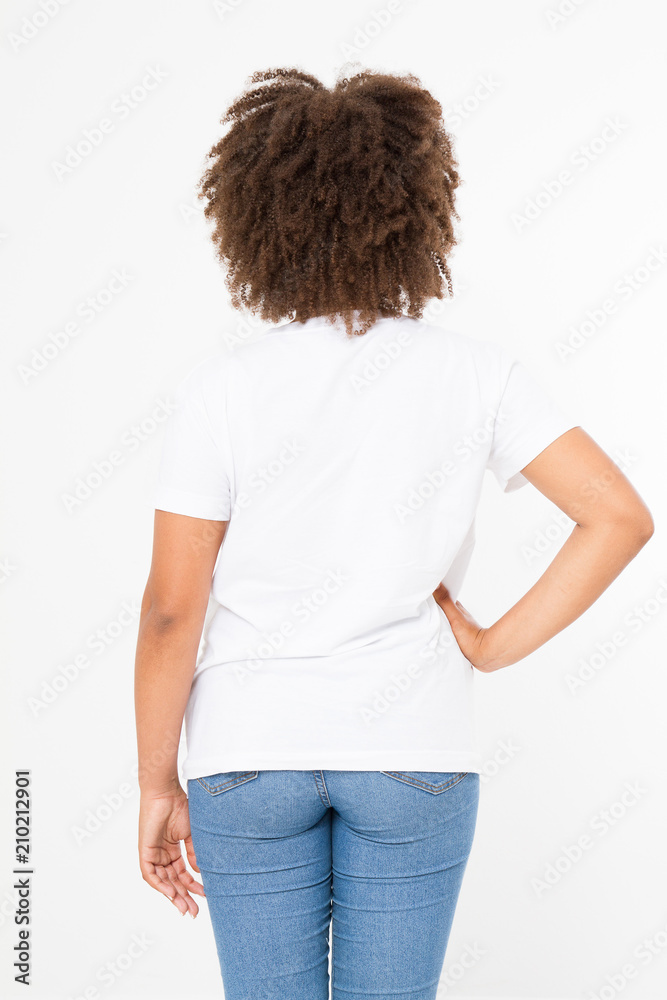 Summer t shirt design and people concept close up of young afro american woman in blank template white t-shirt. Mock up. Copy space. Curly hair. Back rear view. Summer t shirt design and people concept close up of young afro american woman in blank template white t-shirt. Mock up. Copy space. Curly hair. Back rear view.