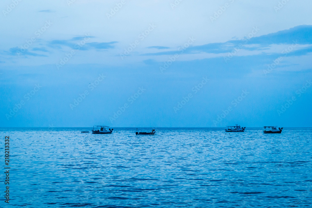Fishing boats on the water in Leptokarya, Greece 
