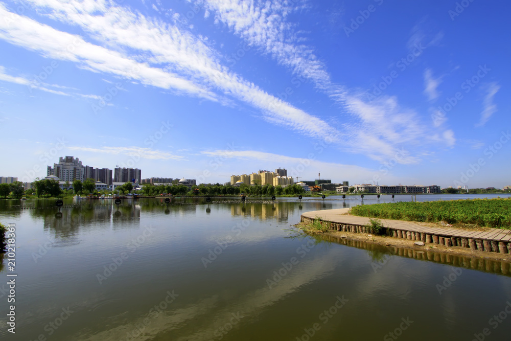Wide water surface and high rise buildings Wide water surface and high rise buildings