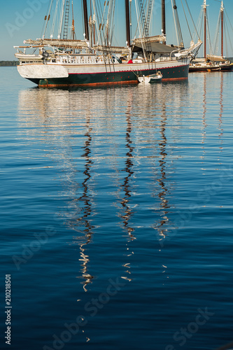 Wooden Boats Reflections Vertical