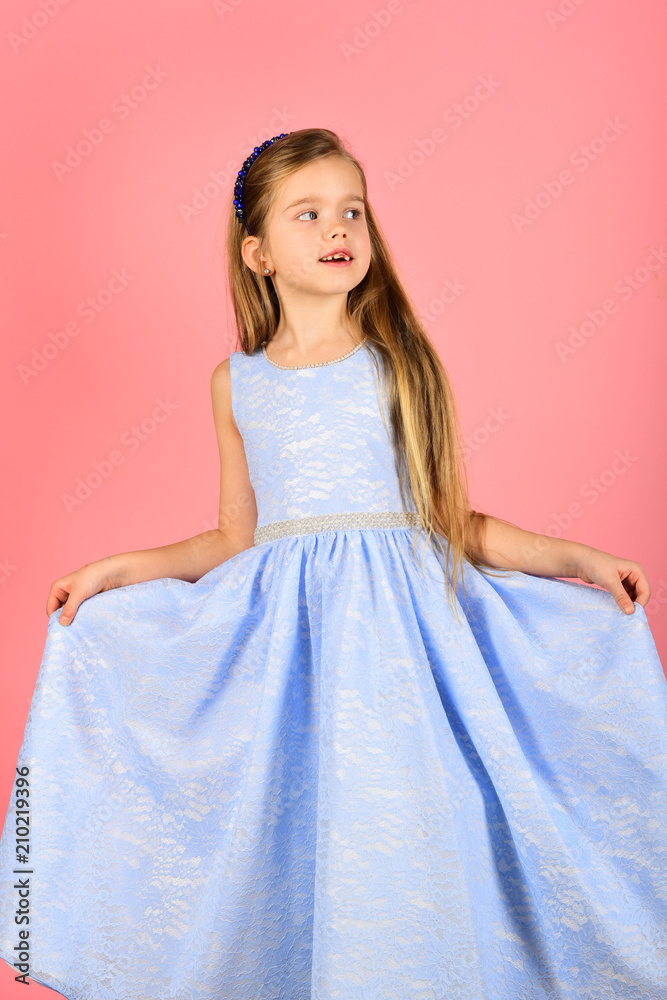 Pretty little girl in dress, beauty concept smiling cute little girl Pretty little girl in dress, beauty concept smiling cute little girl