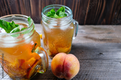 jar of peach tea shot with selective focus