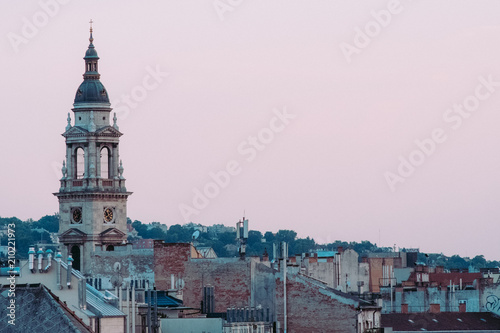 View of St. Stephen s Basilica with purple sky from a rooftop in Budapest  Hungary