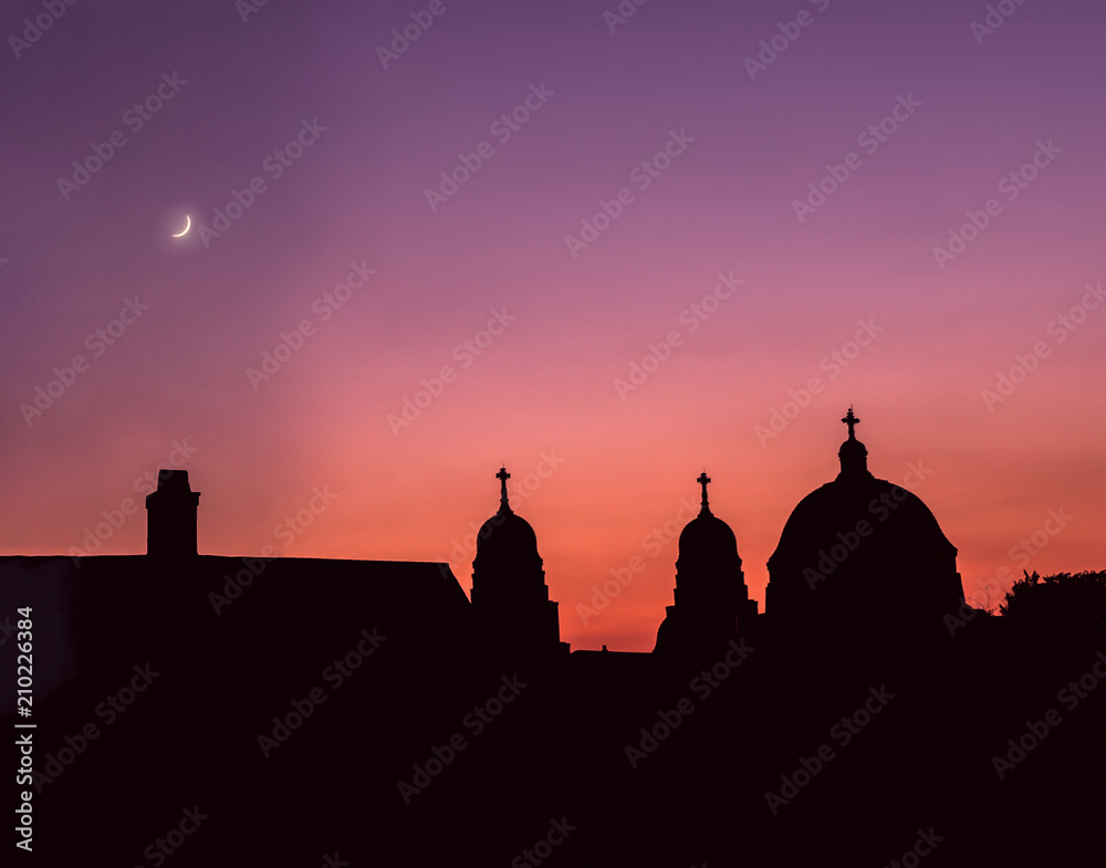 Sunset and Moonrise behind famous Chicago Church...