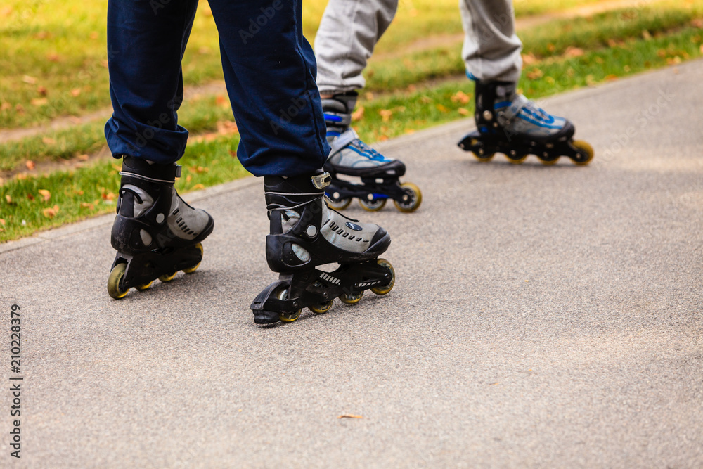 Active people friends rollerskating outdoor. Active people friends rollerskating outdoor.