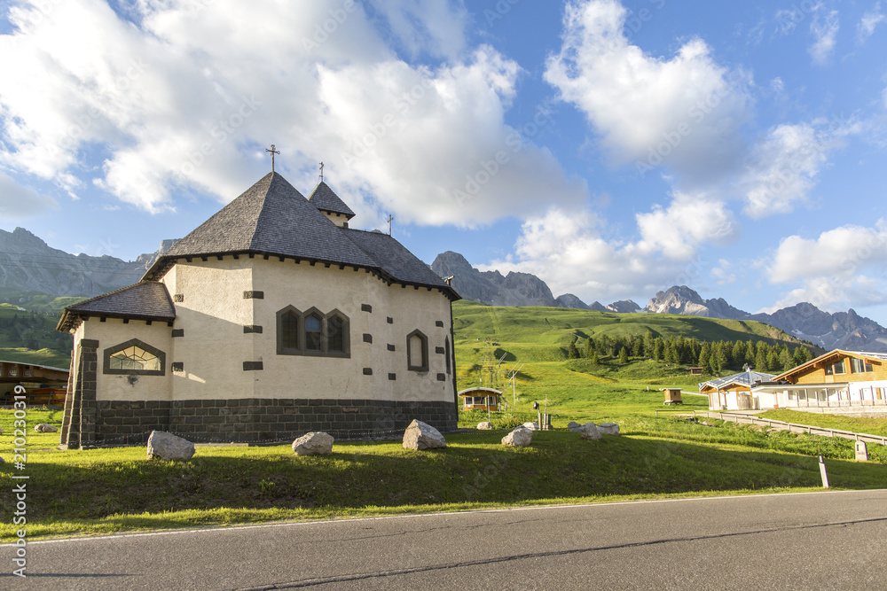 San Pellegrino Pass, Moena, Trentino Alto Adige, Alps, Dolomites, Italy: Landscape at the San Pellegrino Pass (1918 m).It's a high mountain pass in the Italian Dolomites. Summer landscape in the Alps. San Pellegrino Pass, Moena, Trentino Alto Adige, Alps, Dolomites, Italy: Landscape at the San Pellegrino Pass (1918 m).It's a high mountain pass in the Italian Dolomites. Summer landscape in the Alps.