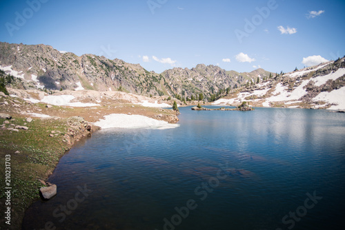 Landscape view of Booth Lake with mountains in the background near Vail, Colorado.