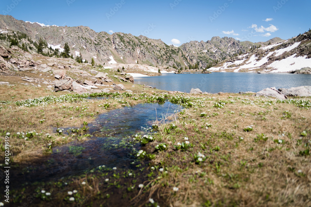 Low angle view of a stream running into Booth Lake near Vail, Colorado. 