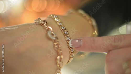 Jewels Market - the seller shows gold jewelry earrings, rings, bracelets, chain