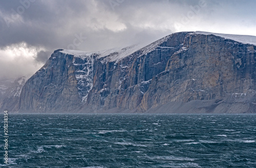 Fototapeta Naklejka Na Ścianę i Meble -  Dramatic Cliffs Above Storm Tossed Seas
