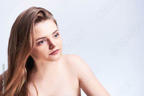 Studio portrait of young beautiful woman