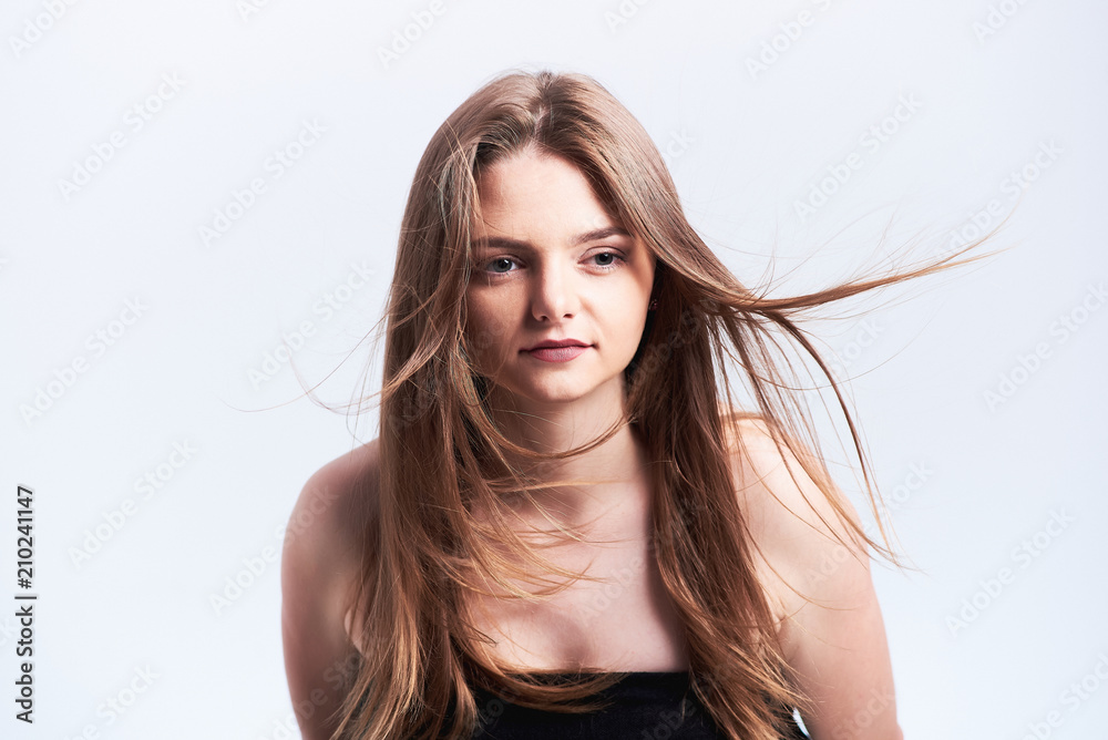 Fototapeta premium Studio portrait of young beautiful woman