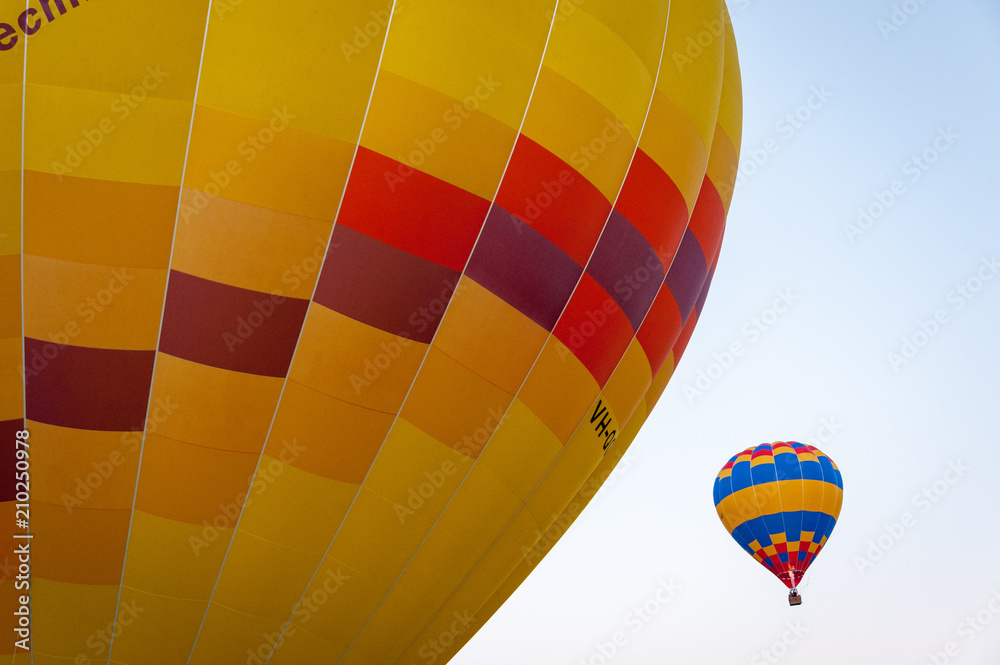 Obraz premium Colorful hot air balloon taking off