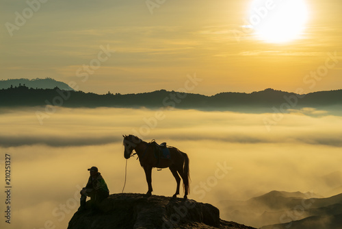 BROMO, INDONESIA - 16th APRIL 2018; Unidentified local people or Bromo Horseman at the mountainside of Mount Bromo, Semeru, Tengger National Park, East Java of Indonesia.
