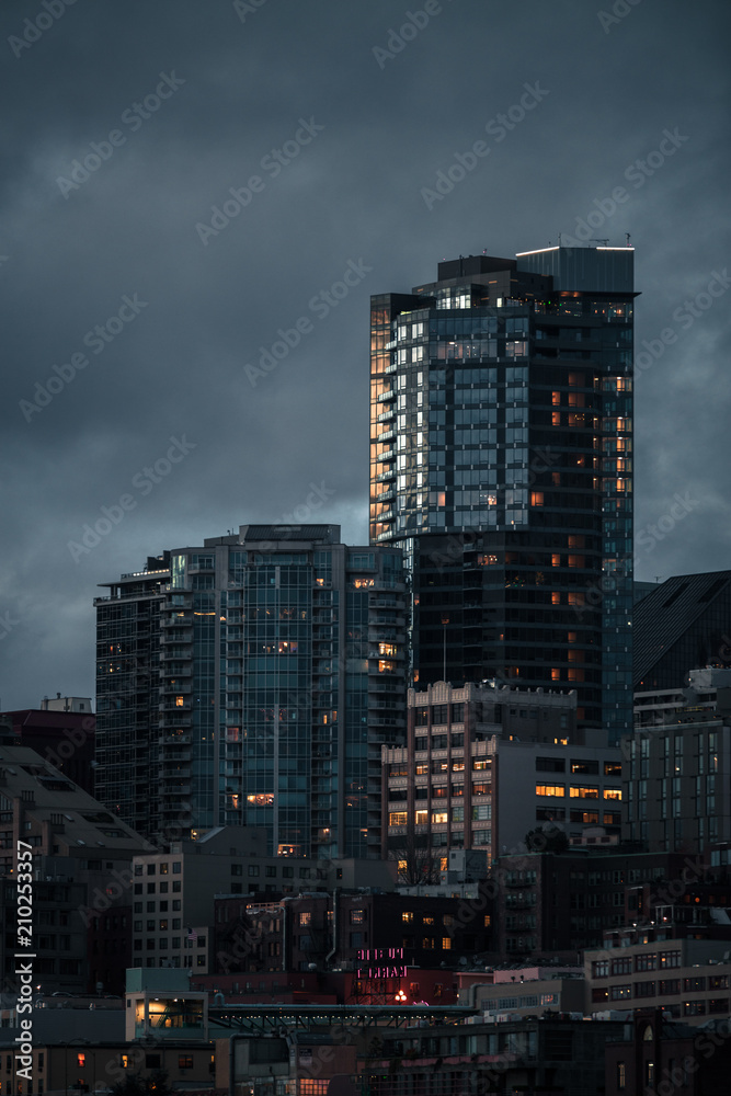 Tall Buildings In Seattle During A Cloudy Sunset Tall Buildings In Seattle During A Cloudy Sunset