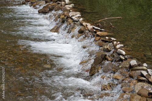 Clean mountain river/ stream photo