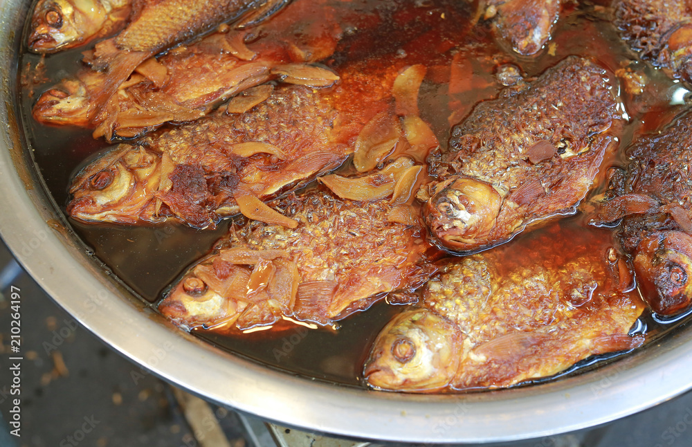Sweet and sour boiled thai carp fish.