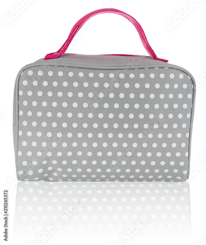 Feminine beautician to store cosmetics. Purse for women made of gray material with white dots with a pink handle, with space for a logo.