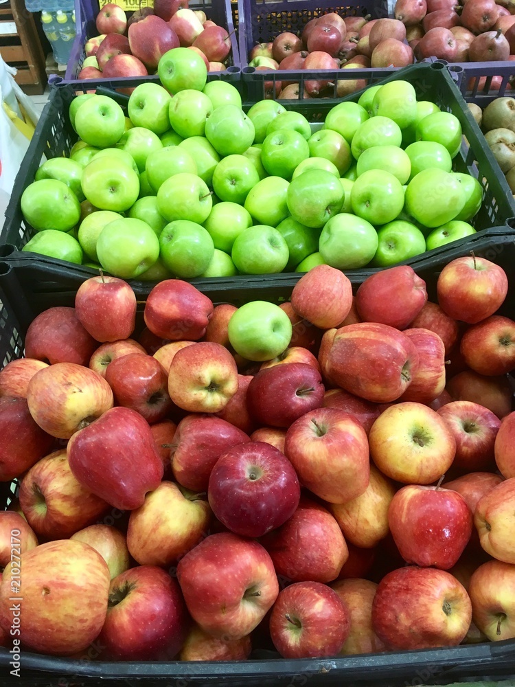Fresh apples on the shelves of the market Fresh apples on the shelves of the market