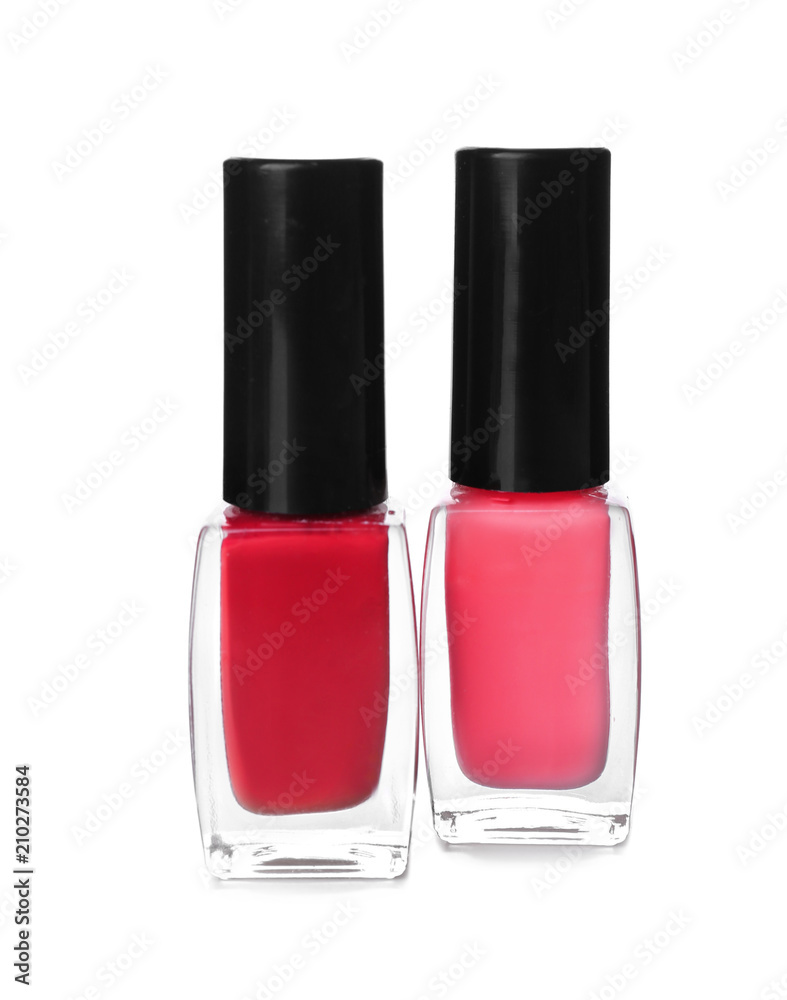 Bottles of colorful nail polishes on white background Bottles of colorful nail polishes on white background