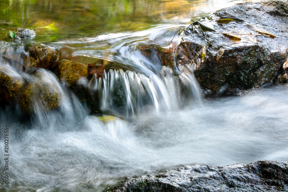 Fototapeta premium Close up of Waterfall mini River Stream in the National Park.
