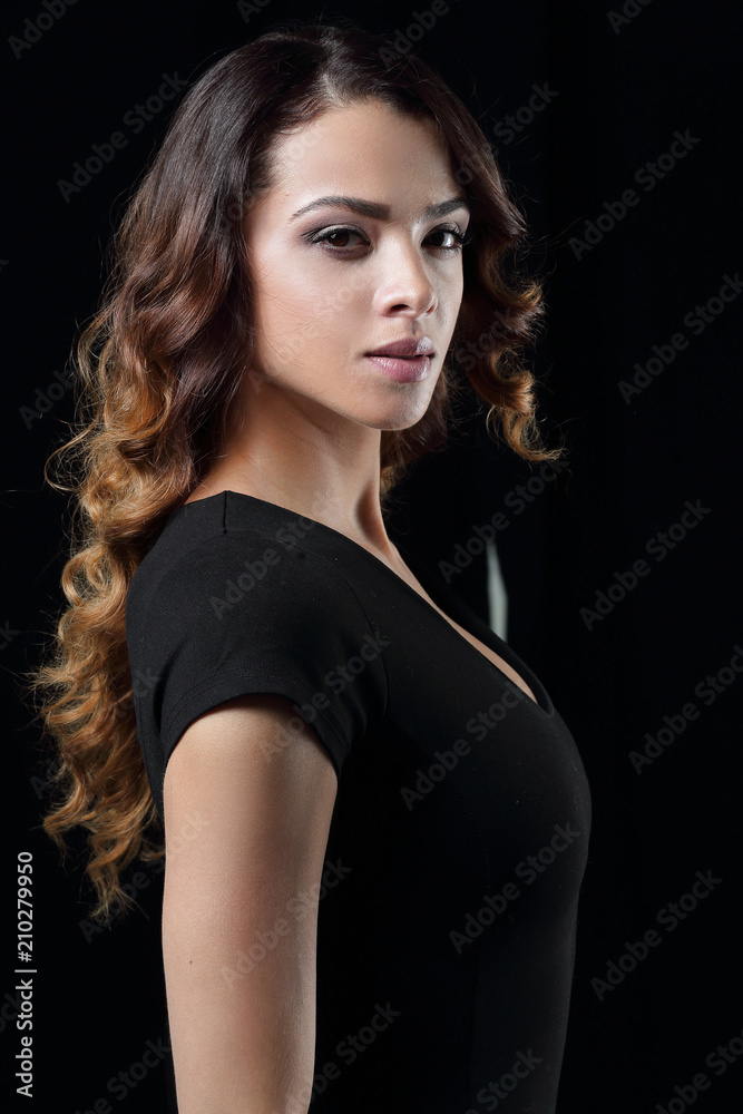 Naklejka premium Beautiful and attractive model in black dress.