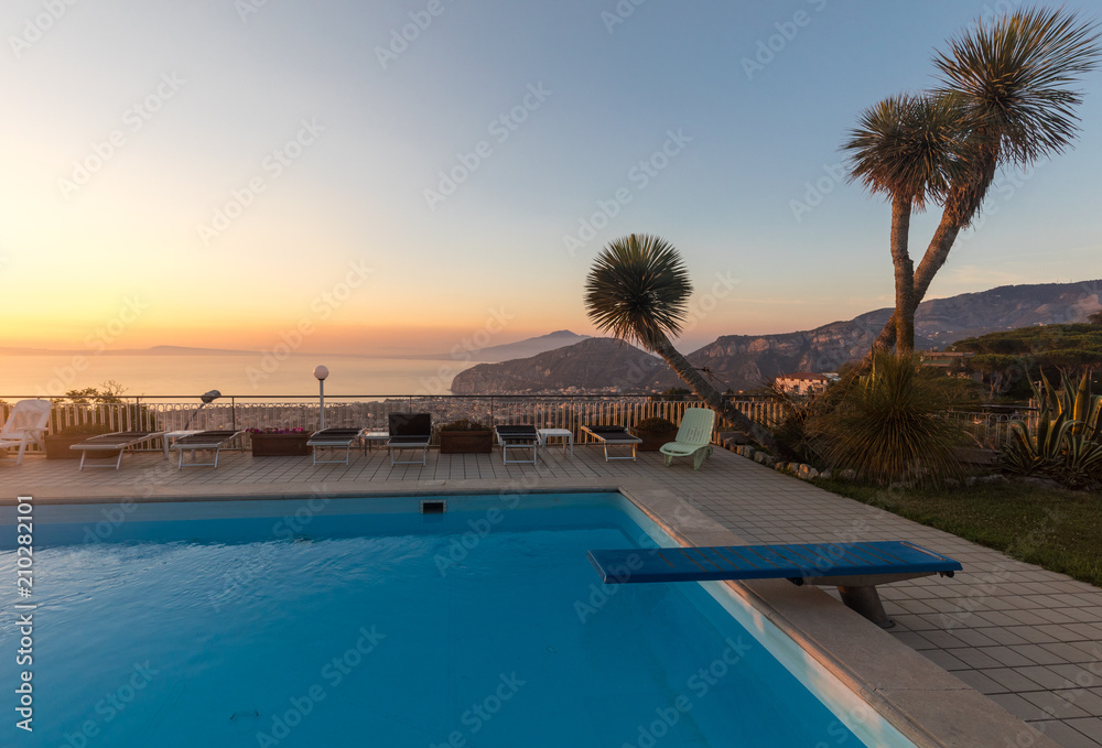 Fototapeta premium Swimming pool on the Amalfi Coast with views of the Gulf of Naples and Vesuvius. Sorrento. Italy