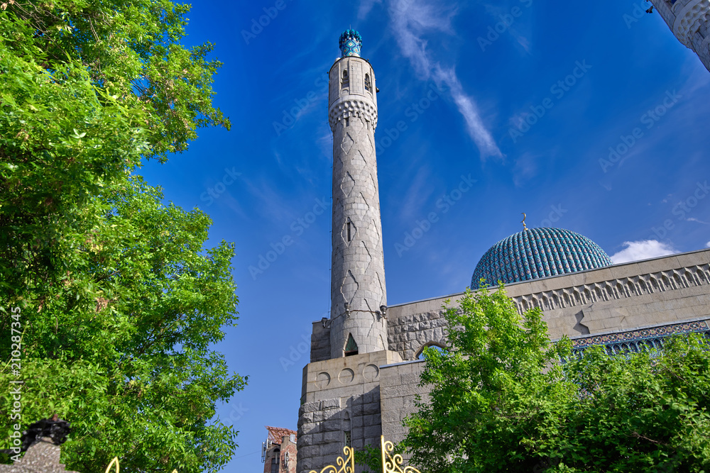 Fototapeta premium Muslim Mosque with minarets close-up