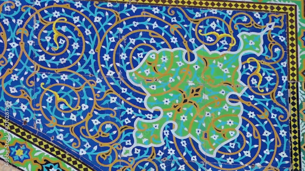 A zoom out shot of a pattern painted on a mosque.