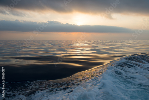 sunrise over sea  beautiful clouds