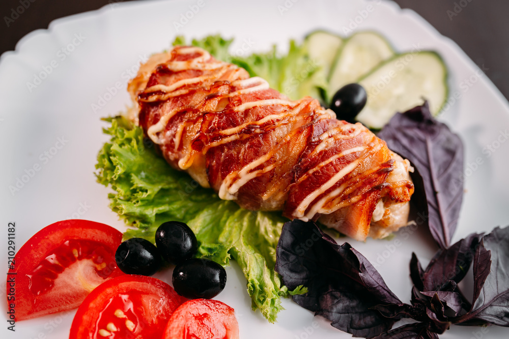 European international fusion cuisine, a beautiful dish on a white plate decorated with herbs and vegetables. a professional chef has prepared a delicious meal. European international fusion cuisine, a beautiful dish on a white plate decorated with herbs and vegetables. a professional chef has prepared a delicious meal.