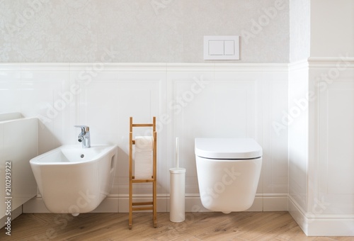 White ceramic toilet and bidet photo