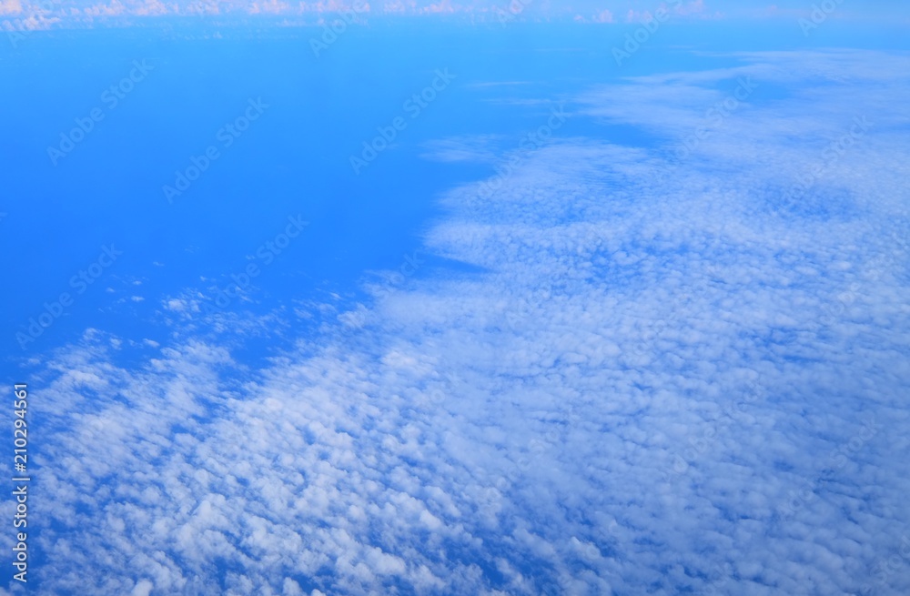 Beautiful blue sky and white cloud view from the plane