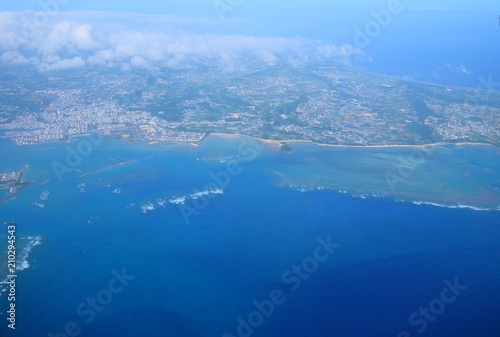 Beautiful blue sky and white cloud and landscape view from the plane in Japan Okinawa