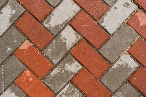 Pavement. Sidewalk tile background. Pavement tile. Top view. Closeup. Concrete tiles