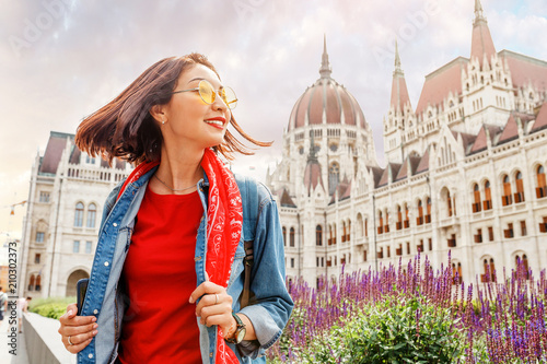 Photography Happy asian casual woman student enjoying great view of the Parliament building