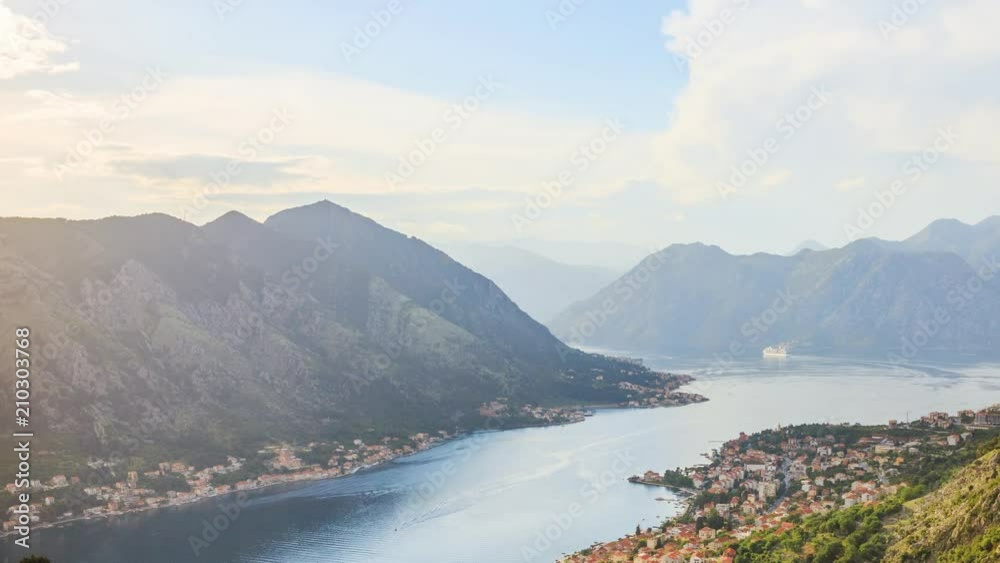 Time Lapse, view from above on the bay in Adriatic sea with cruise liner near the Kotor city at sunset time, Montenegro Time Lapse, view from above on the bay in Adriatic sea with cruise liner near the Kotor city at sunset time, Montenegro
