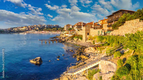 Coastal landscape banner, panorama - embankment with fortress wall in the city of Sozopol on the Black Sea coast in Bulgaria photo