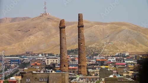 A steady shot of the tall ancient minarets in Heret. photo