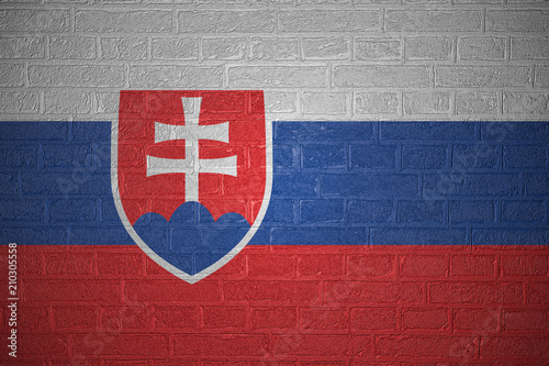 Flag of Slovakia on brick wall background, 3d illustration