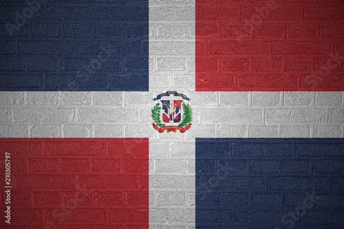 Flag of the Dominican Republic on brick wall background, 3d illustration