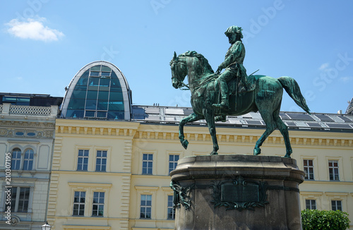 Canvas Print Equestrian statue of Holy Roman Emperor Joseph II at Josefsplatz in front of the Hofburg Palace in Vienna, Austria