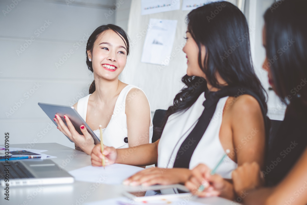 Young asian businesswoman working happy smile and relax in office Young asian businesswoman working happy smile and relax in office