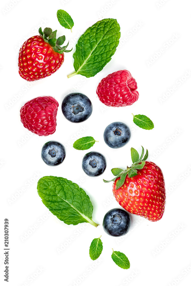 Various fresh forest berries isolated on white background, top view. Berry border frame. Flat lay.