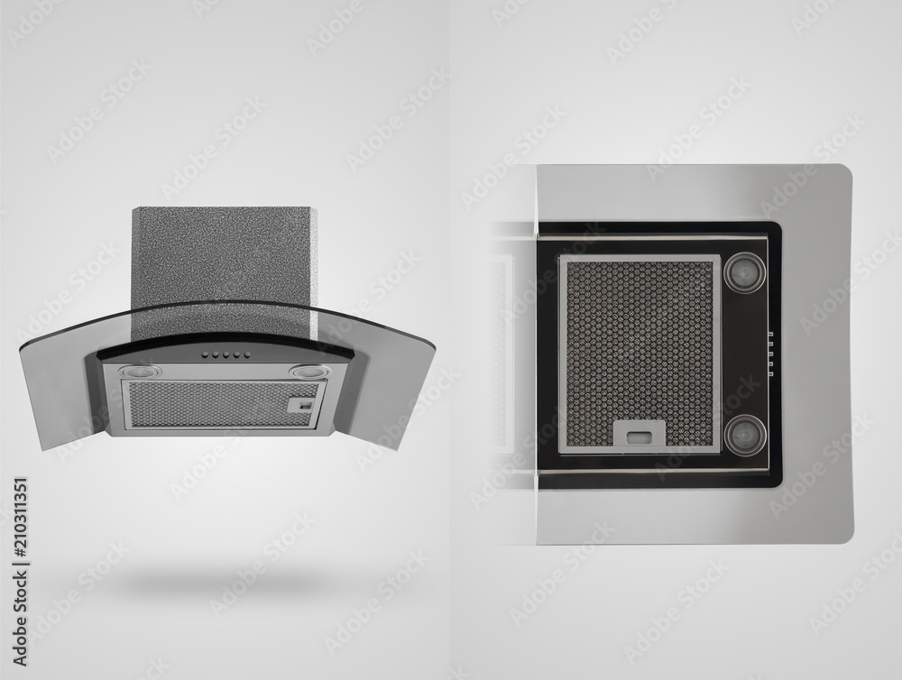 grey kitchen hood in two angles on a white background. kitchen appliances. Isolated grey kitchen hood in two angles on a white background. kitchen appliances. Isolated