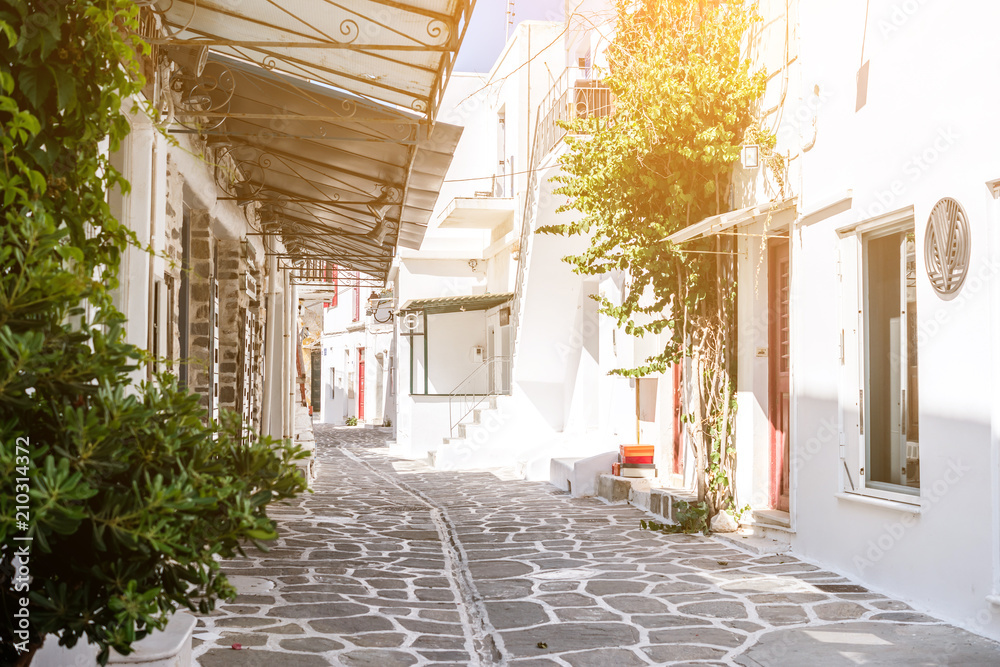 Narrow street with white houses, Greece
